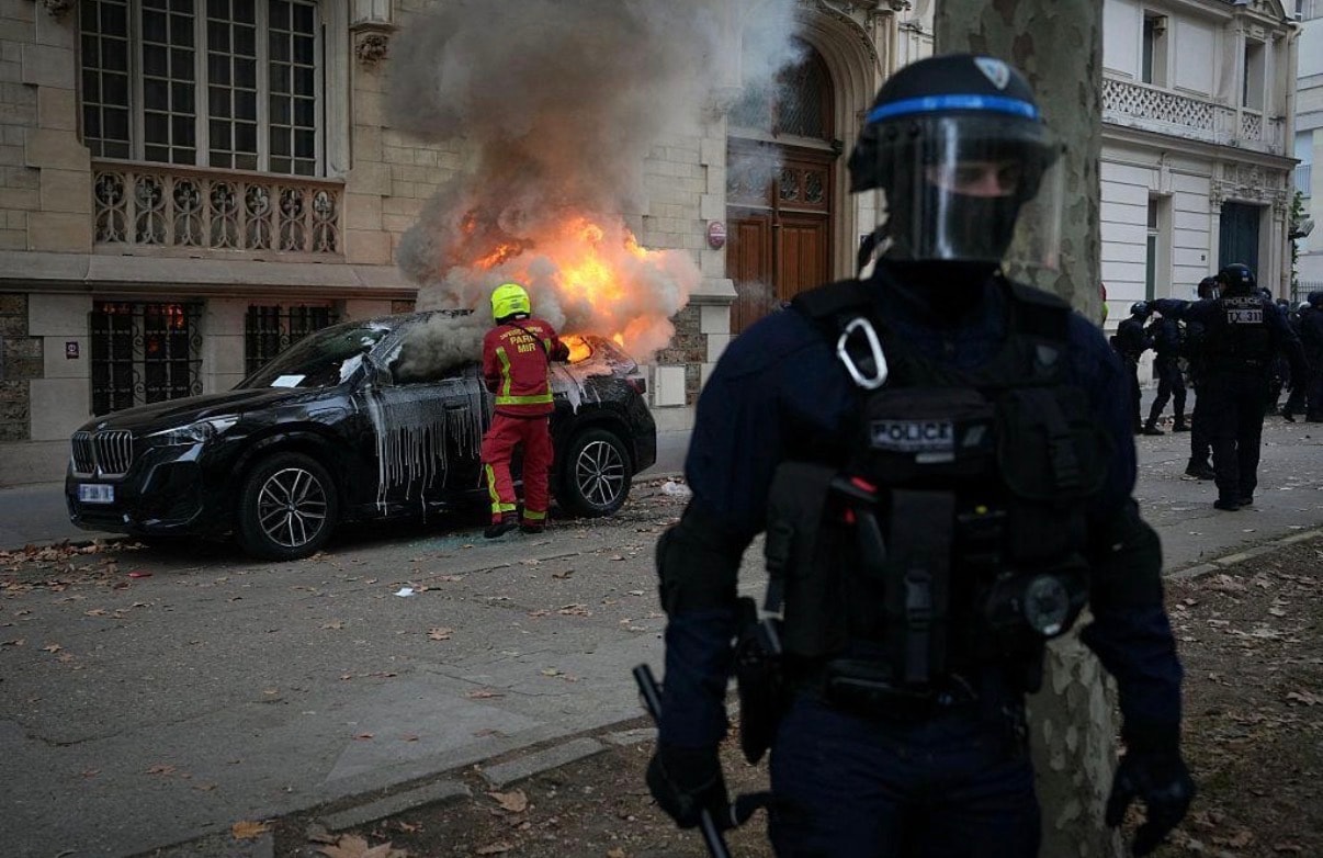 Demonstrators marching through French streets, October 2026