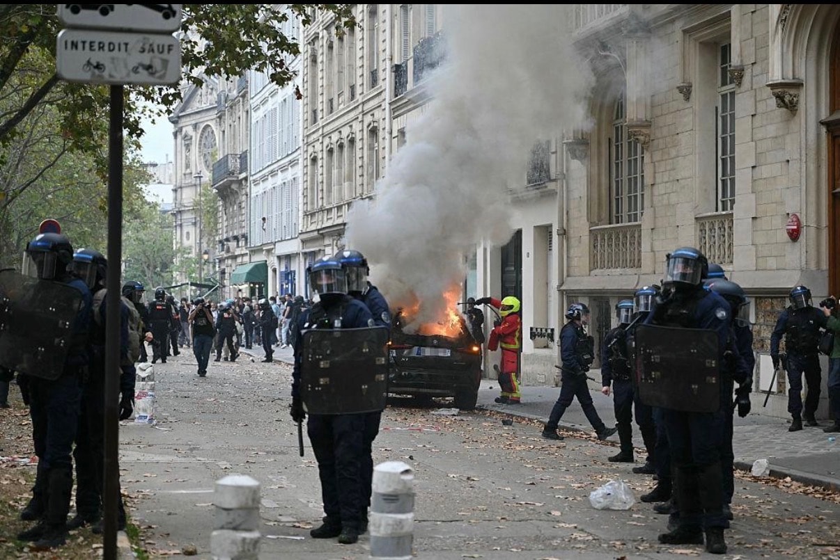 Protesters in the streets of France, October 2026